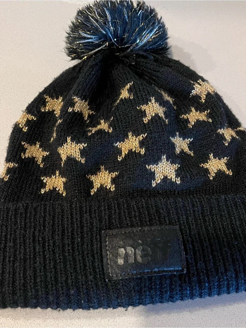 Neff Black Beanie with Gold Star Accents and Pom